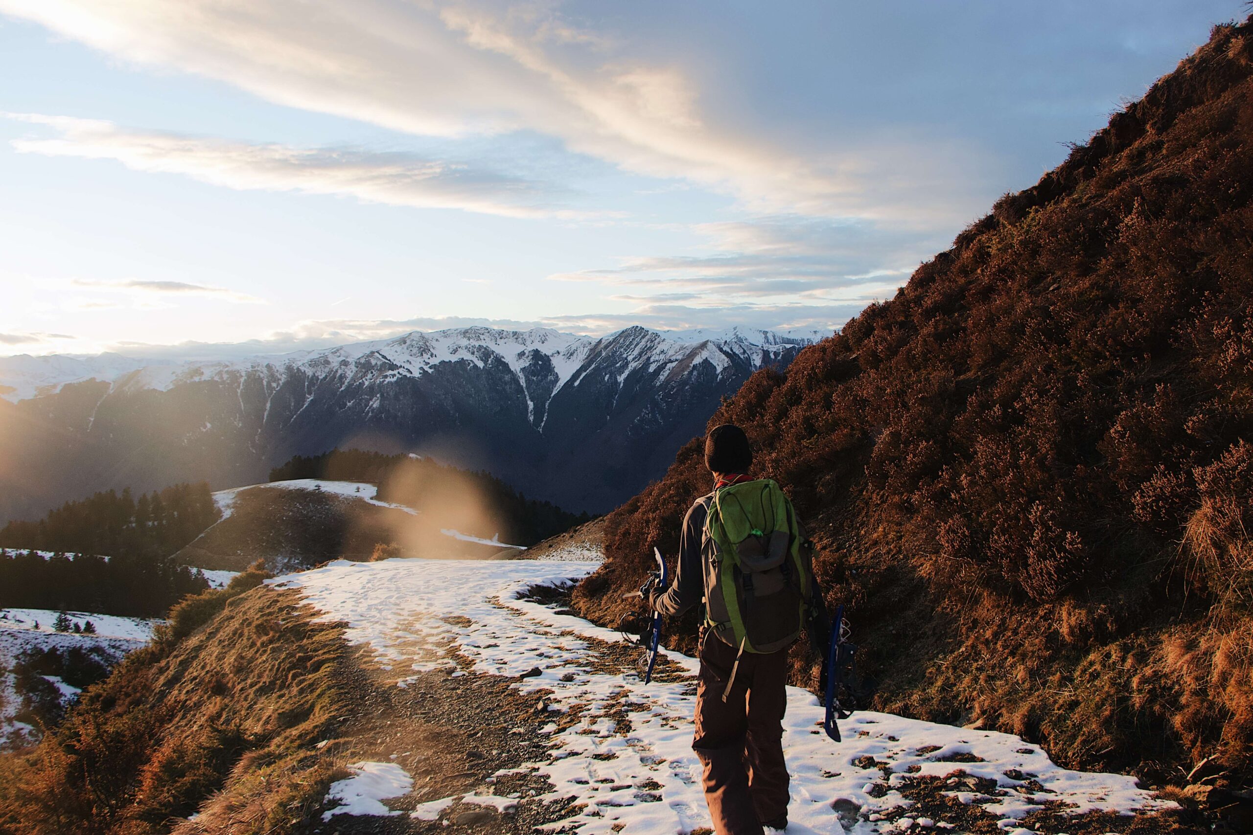 shot-hiker-mountains-covered-snow